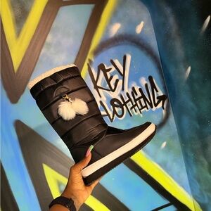 Stylish Black Boots with Pom Poms